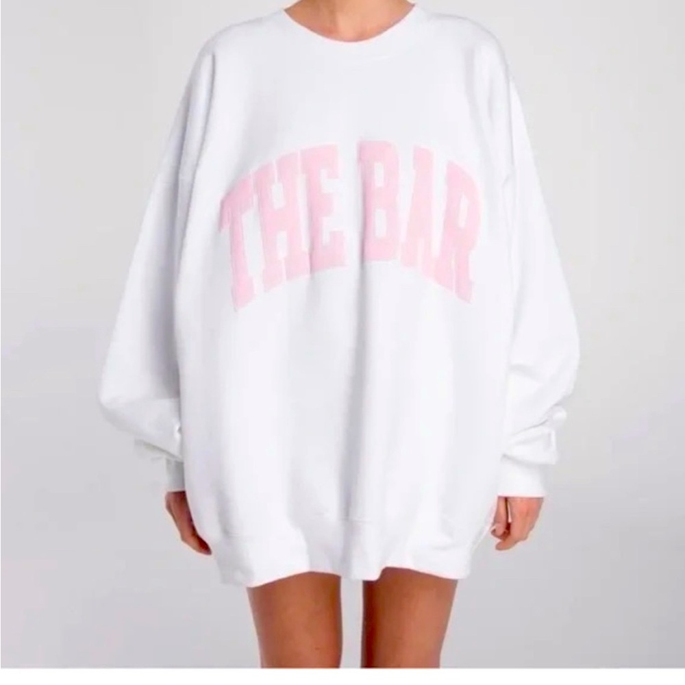 The Bar white sweatshirt with light pink lettering